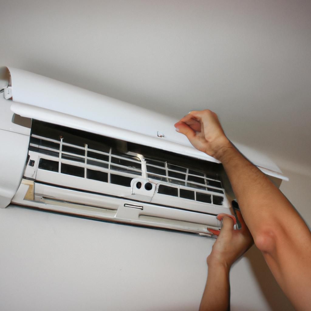 Person adjusting air conditioning unit